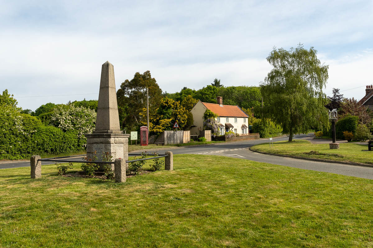 A view of the Bracon Ash War Memorial seen from the Village Hall